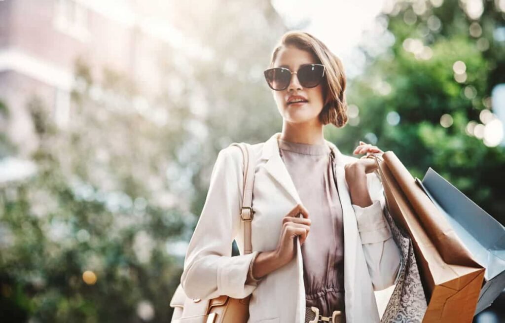 How Much Does a Typical 45-Year-Old Have Saved in Their TFSA and RRSP? shopper carries paper bags with purchases